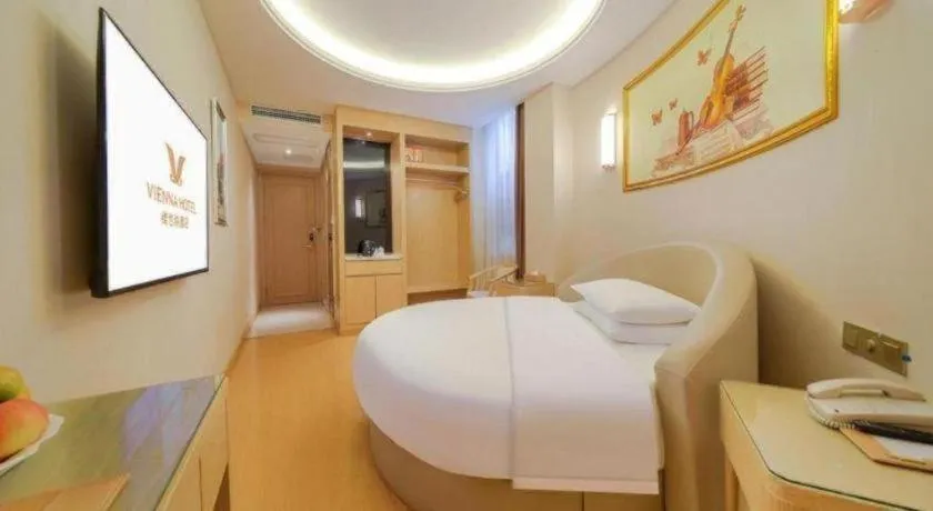 Bed in Vienna Hotel Zhengzhou Fengchan Road Fortune Plaza