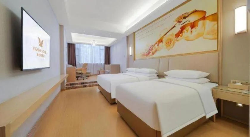 Bed in Vienna Hotel Zhengzhou Fengchan Road Fortune Plaza