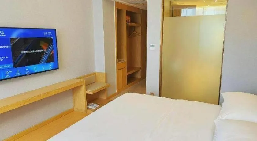 Bed in Vienna Hotel Zhengzhou Fengchan Road Fortune Plaza