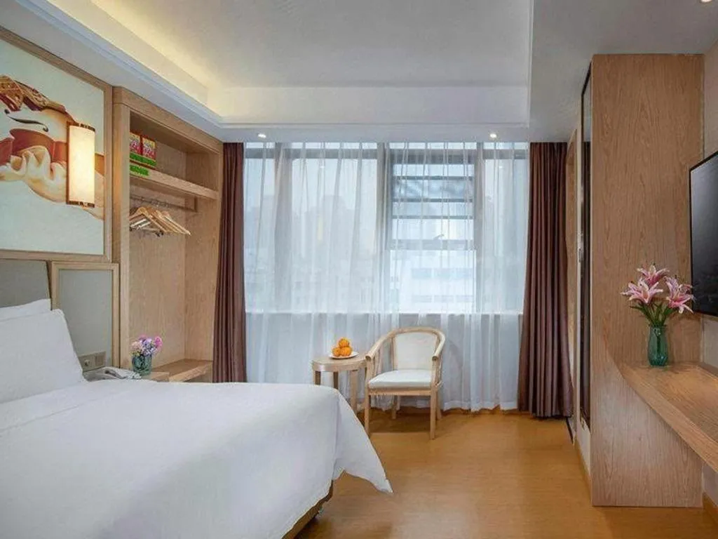 Bed in Vienna Hotel Zhengzhou Fengchan Road Fortune Plaza