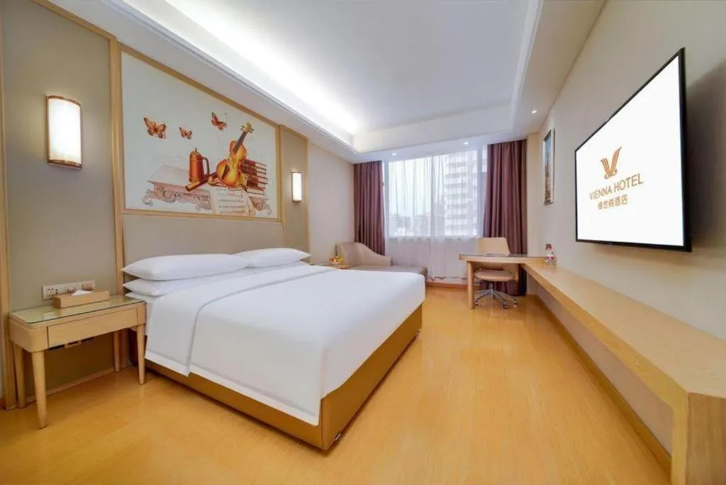 Bed in Vienna Hotel Zhengzhou Fengchan Road Fortune Plaza