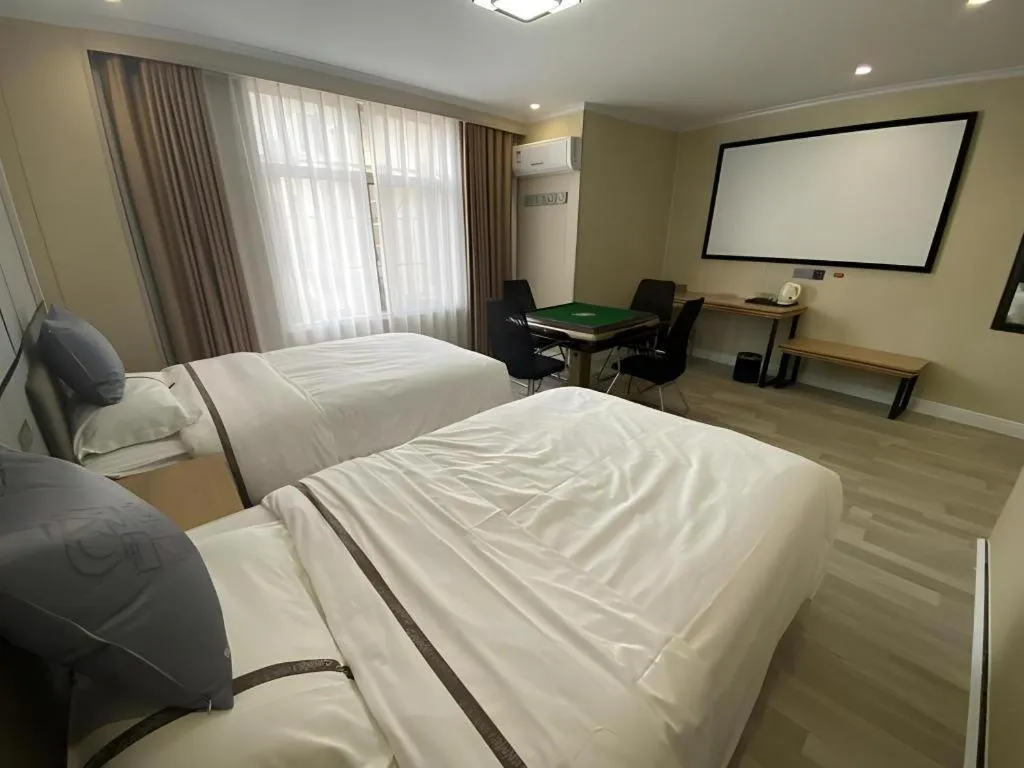 Bed in Jun Light Hotel Jiangxi Jiujiang Yongxiu County Dongyong Mall