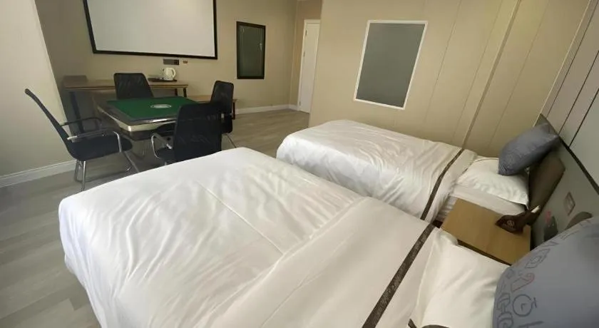 Bed in Jun Light Hotel Jiangxi Jiujiang Yongxiu County Dongyong Mall