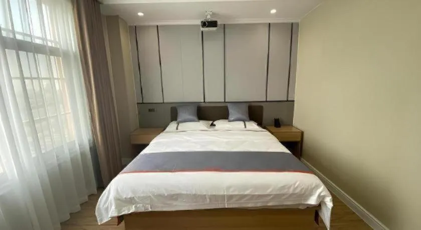 Bed in Jun Light Hotel Jiangxi Jiujiang Yongxiu County Dongyong Mall