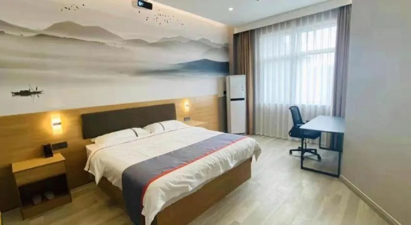 Bed in Jun Light Hotel Jiangxi Jiujiang Yongxiu County Dongyong Mall