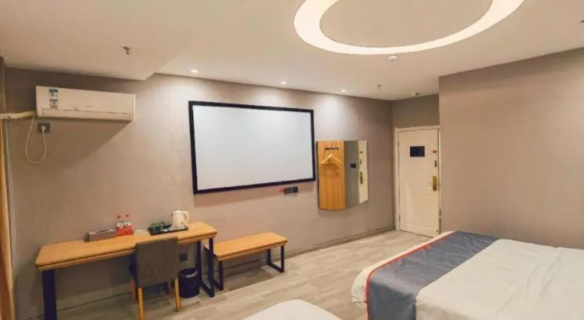 Bed in Jun Light Hotel Jiangxi Jiujiang Yongxiu County Dongyong Mall