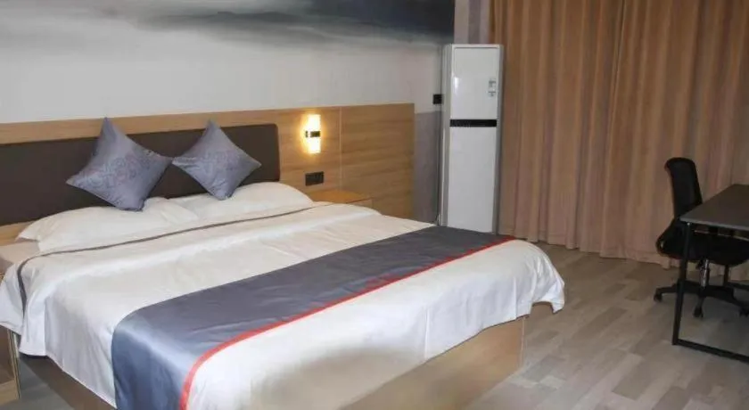 Bed in Jun Light Hotel Jiangxi Jiujiang Yongxiu County Dongyong Mall