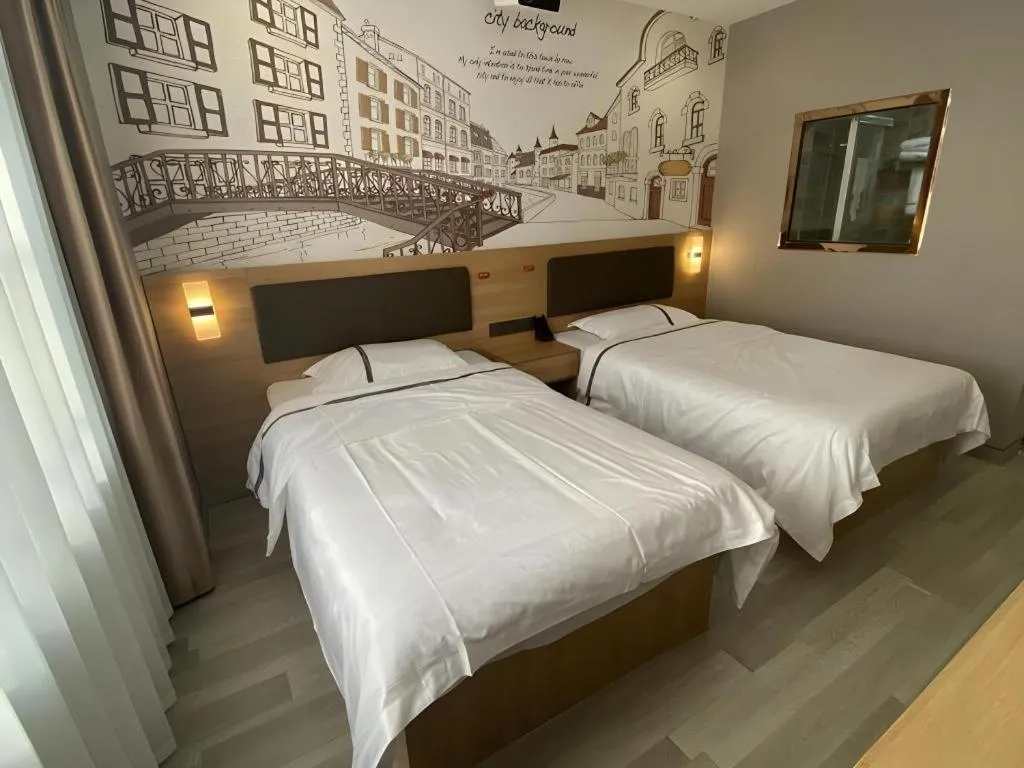 Bed in Jun Light Hotel Jiangxi Jiujiang Yongxiu County Dongyong Mall