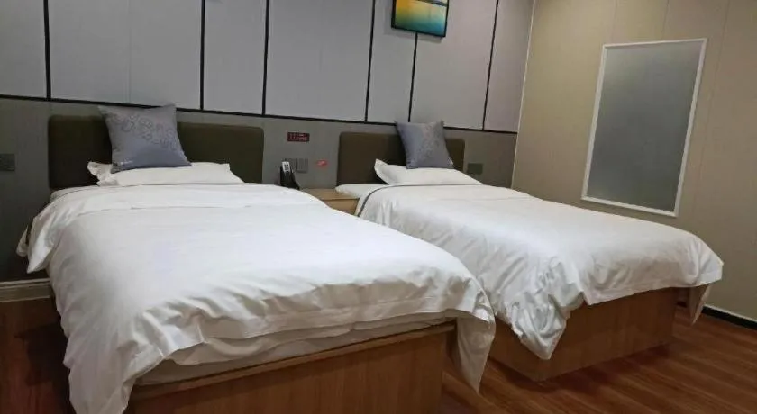 Bed in Jun Light Hotel Jiangxi Jiujiang Yongxiu County Dongyong Mall
