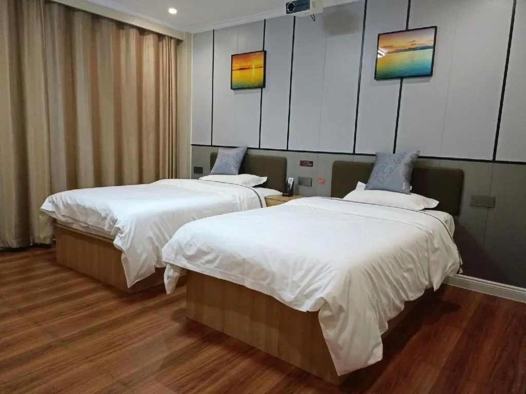Bed in Jun Light Hotel Jiangxi Jiujiang Yongxiu County Dongyong Mall