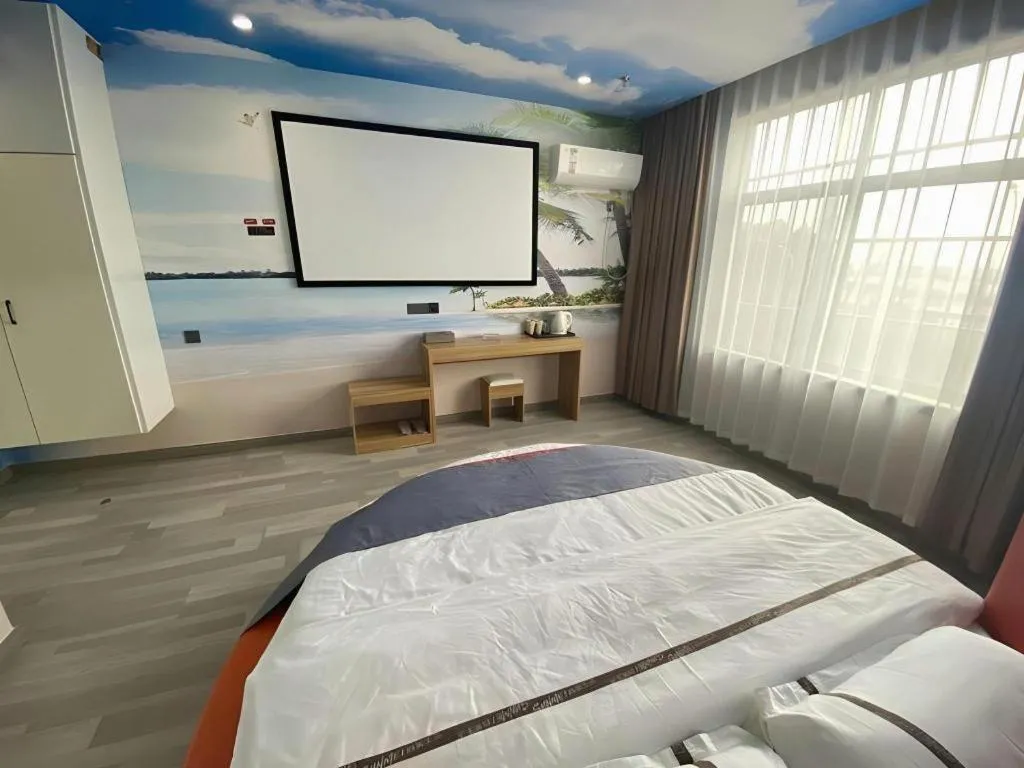 Bed in Jun Light Hotel Jiangxi Jiujiang Yongxiu County Dongyong Mall