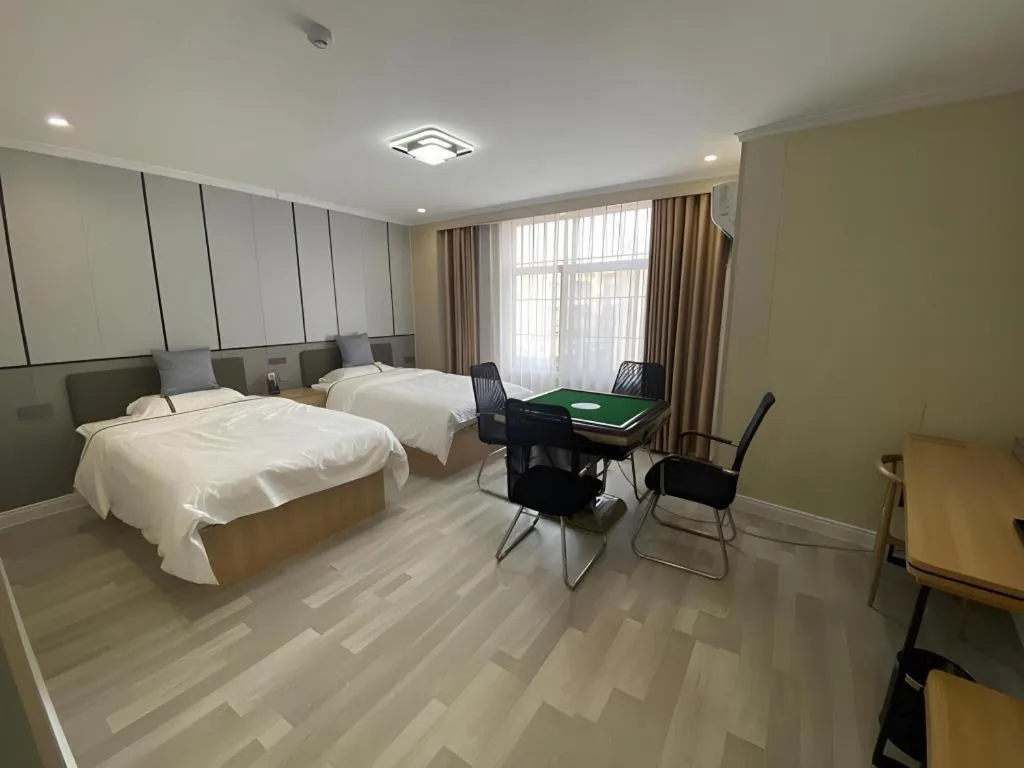Bed in Jun Light Hotel Jiangxi Jiujiang Yongxiu County Dongyong Mall