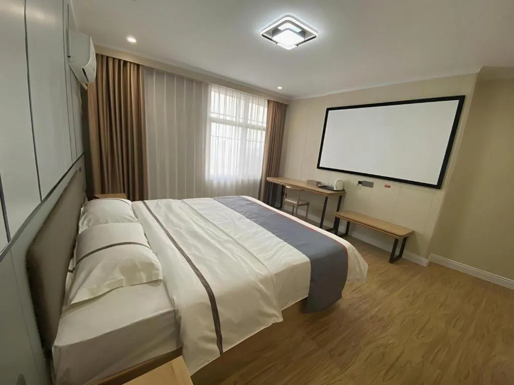 Bed in Jun Light Hotel Jiangxi Jiujiang Yongxiu County Dongyong Mall