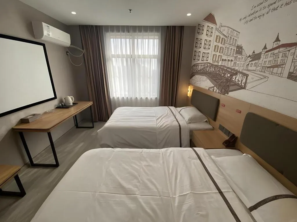 Bed in Jun Light Hotel Jiangxi Jiujiang Yongxiu County Dongyong Mall