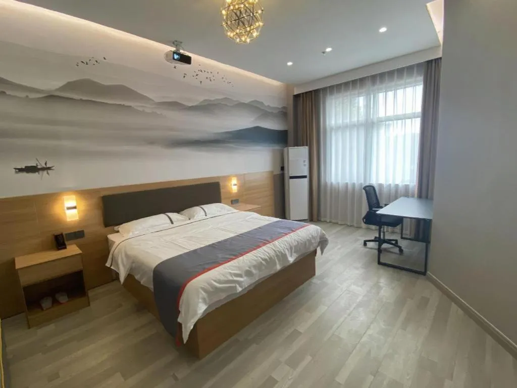 Bed in Jun Light Hotel Jiangxi Jiujiang Yongxiu County Dongyong Mall