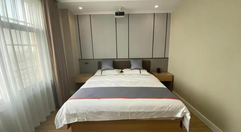Bed in Jun Light Hotel Jiangxi Jiujiang Yongxiu County Dongyong Mall