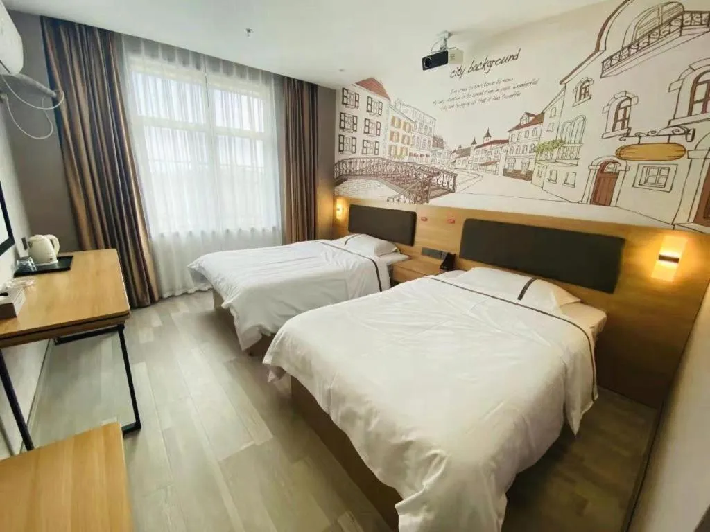 Bed in Jun Light Hotel Jiangxi Jiujiang Yongxiu County Dongyong Mall