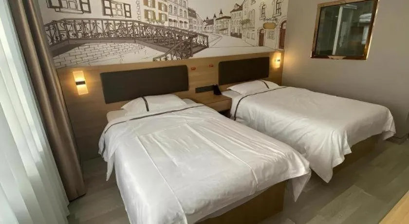 Bed in Jun Light Hotel Jiangxi Jiujiang Yongxiu County Dongyong Mall