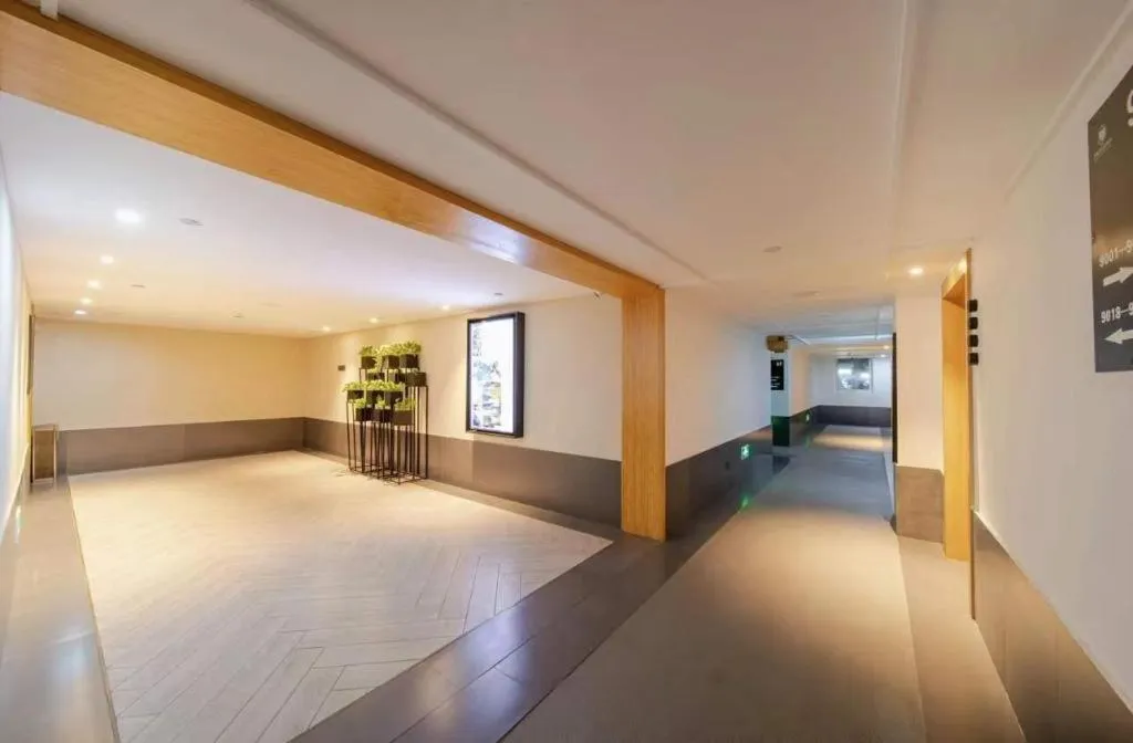 Bed in Meijin All Suites Hotel Suzhou