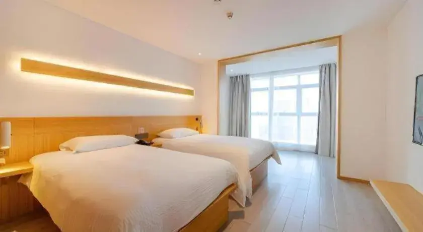 Bed in Meijin All Suites Hotel Suzhou Bed in Meijin All Suites Hotel Suzhou