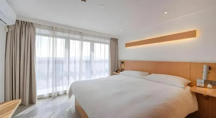 Bed in Meijin All Suites Hotel Suzhou Bed in Meijin All Suites Hotel Suzhou