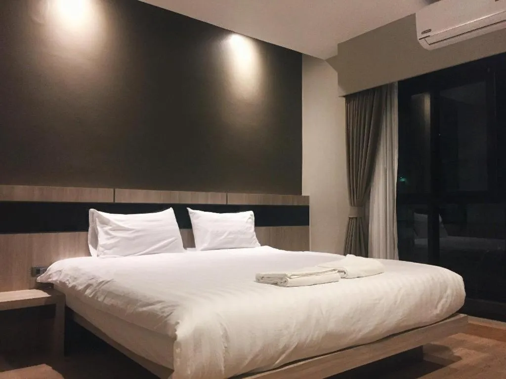 Bed in Melodi Hotel Dannok