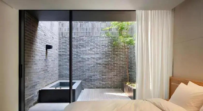 Bed in Namu Hotel Bed in Namu Hotel