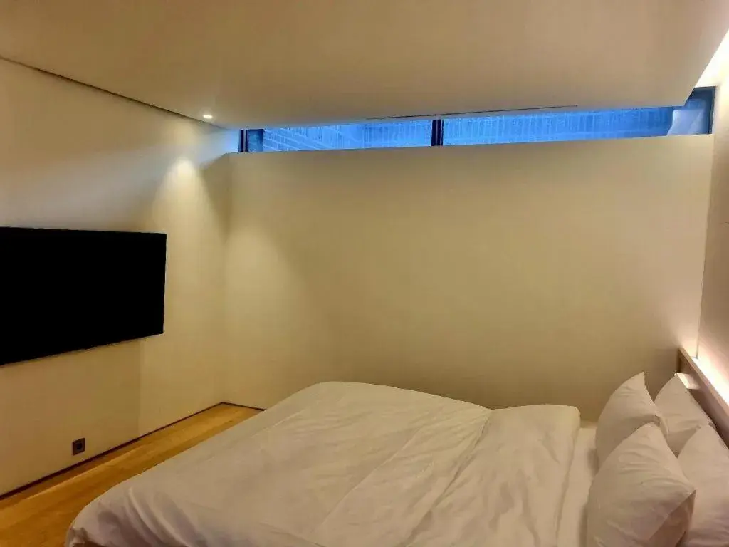 Bed in Namu Hotel Bed in Namu Hotel