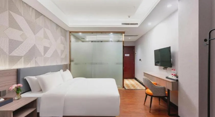 Bed in Borrman Hotel Huizhou Danshui High-speed Railway Huiyang Station