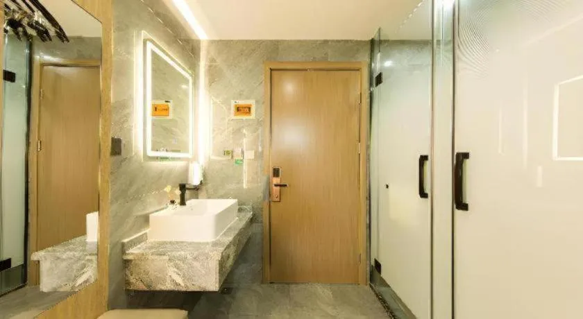 Bed in Borrman Hotel South Beijing Railway Station Caoqiao Station