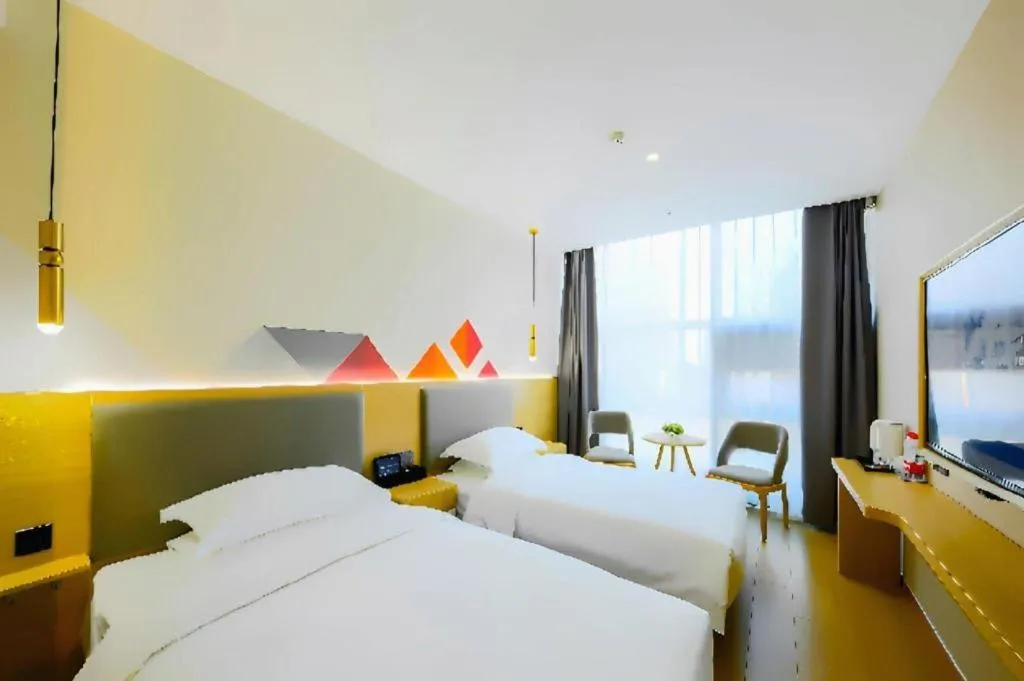 Bed in Borrman Hotel South Beijing Railway Station Caoqiao Station