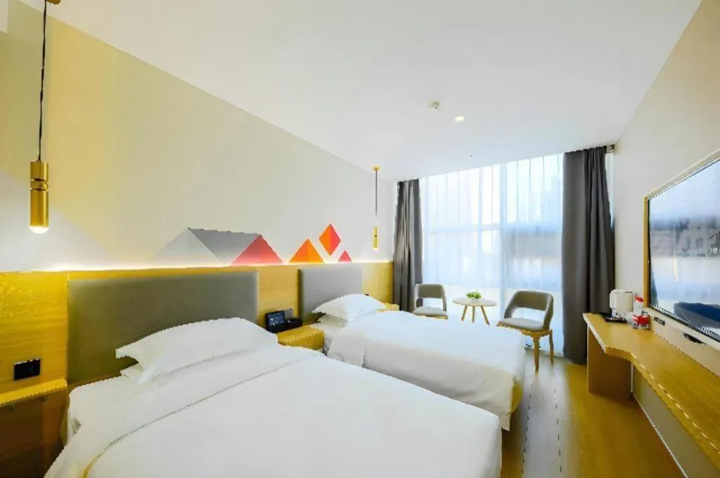 Bed in Borrman Hotel South Beijing Railway Station Caoqiao Station