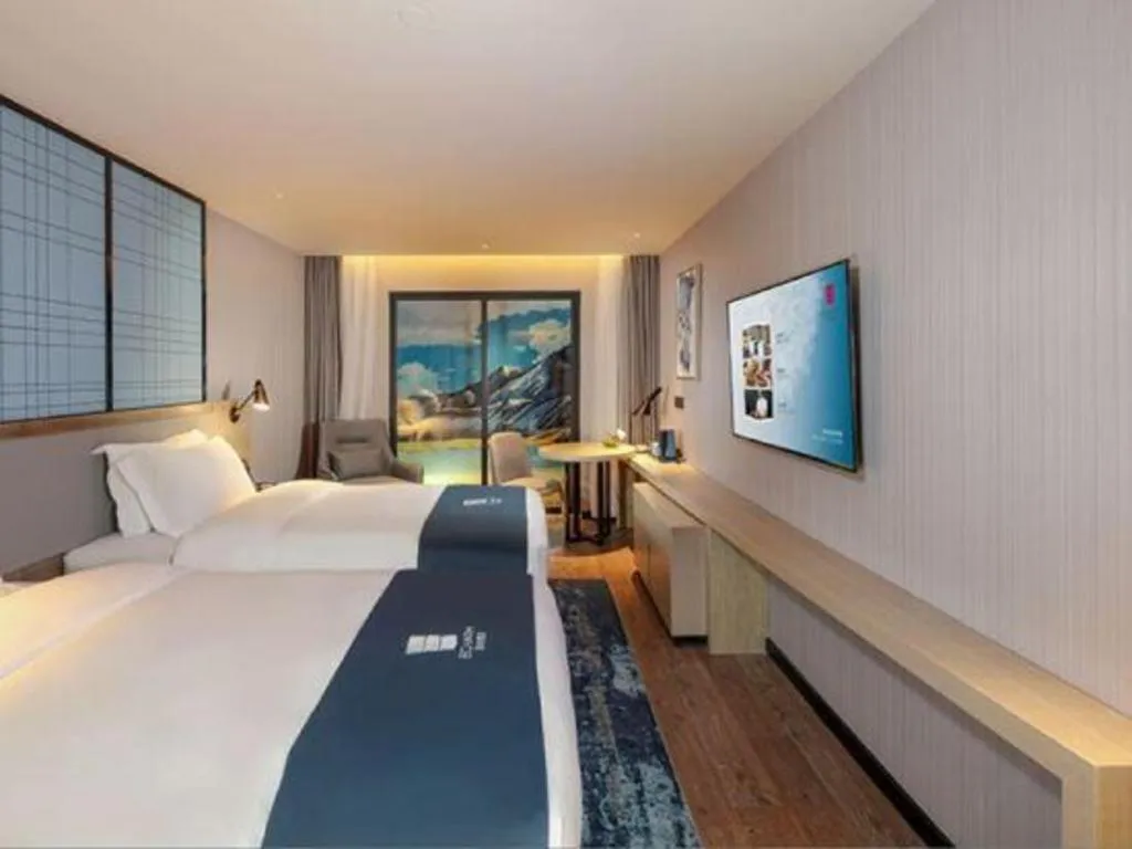 Bed in Echarm Hotel Chengdu Global Center Century City New Exhibition