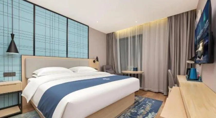 Bed in Echarm Hotel Chengdu Global Center Century City New Exhibition
