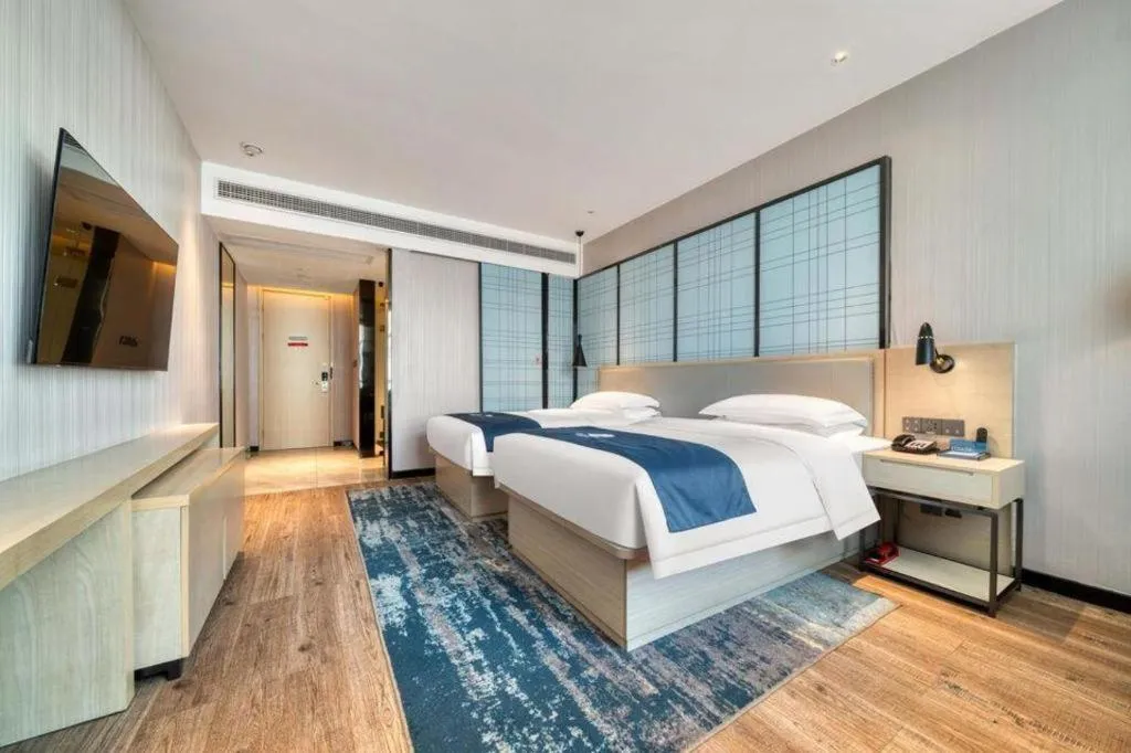 Bed in Echarm Hotel Chengdu Global Center Century City New Exhibition