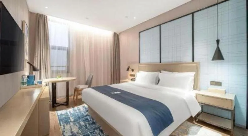 Bed in Echarm Hotel Chengdu Global Center Century City New Exhibition