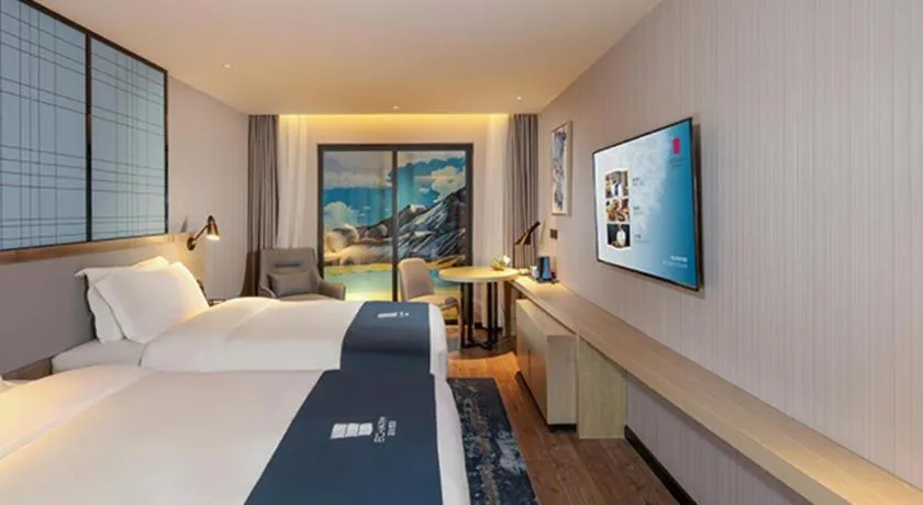 Bed in Echarm Hotel Chengdu Global Center Century City New Exhibition