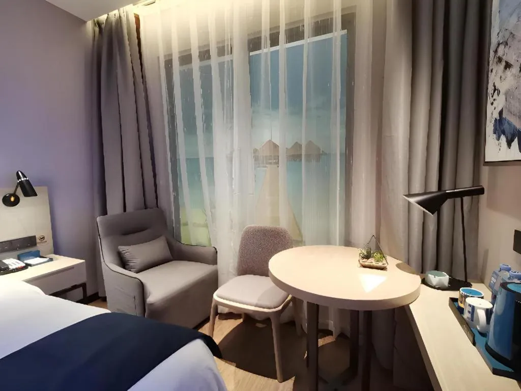 Bed in Echarm Hotel Chengdu Global Center Century City New Exhibition