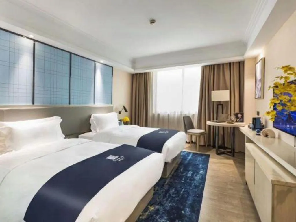 Bed in Echarm Hotel Chengdu Global Center Century City New Exhibition