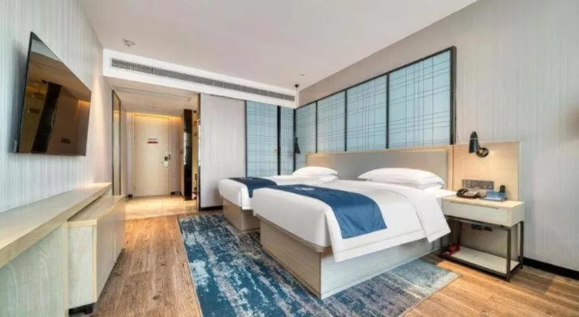 Bed in Echarm Hotel Chengdu Global Center Century City New Exhibition