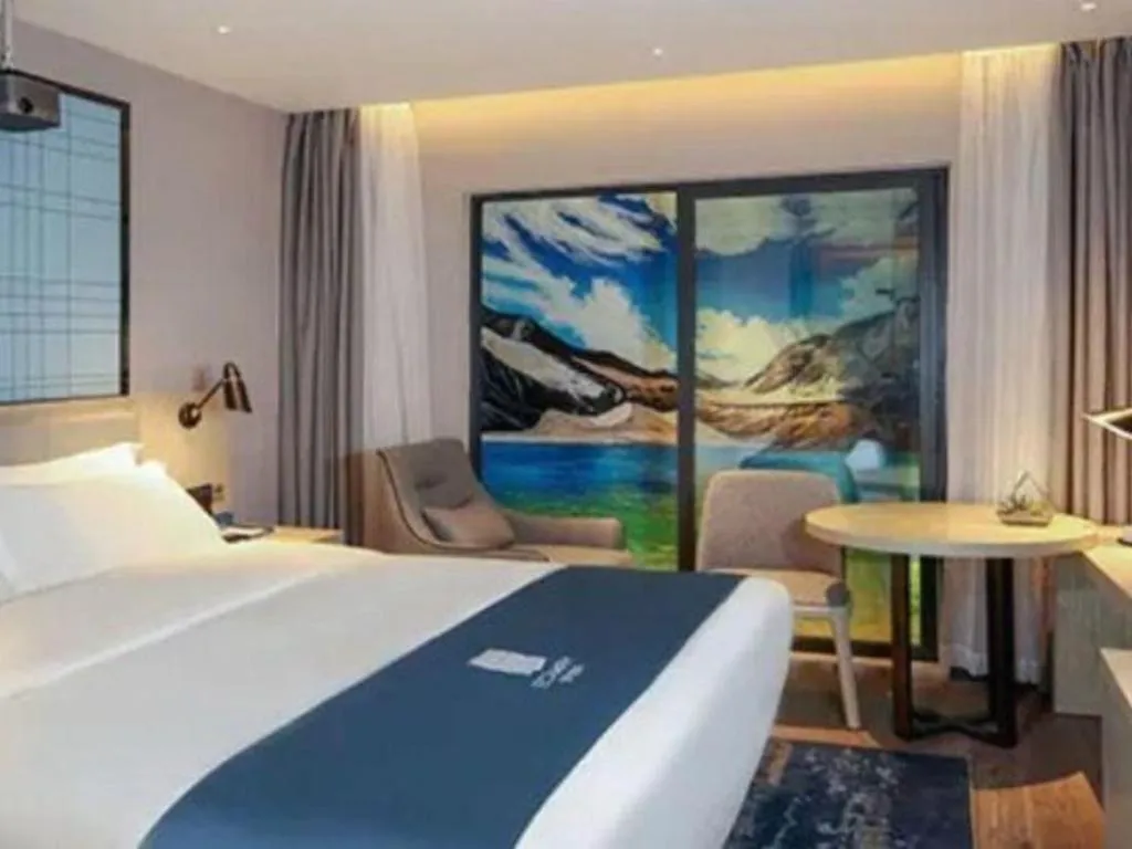Bed in Echarm Hotel Chengdu Global Center Century City New Exhibition