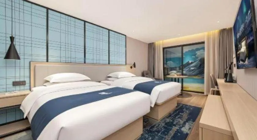 Bed in Echarm Hotel Chengdu Global Center Century City New Exhibition