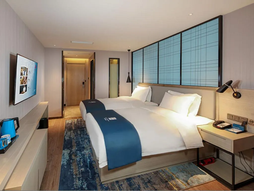 Bed in Echarm Hotel Chengdu Global Center Century City New Exhibition