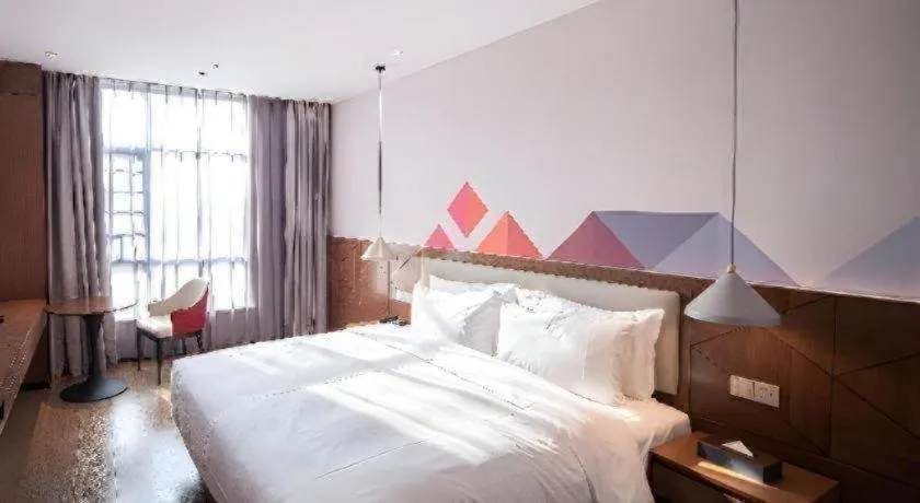 Bed in Borrman Hotel Baise High-speed Railway Station Hengning Plaza