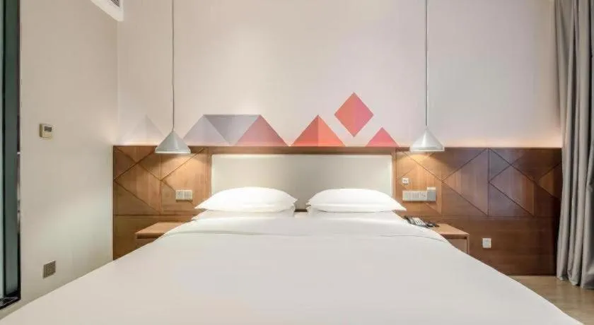 Bed in Borrman Hotel Baise High-speed Railway Station Hengning Plaza