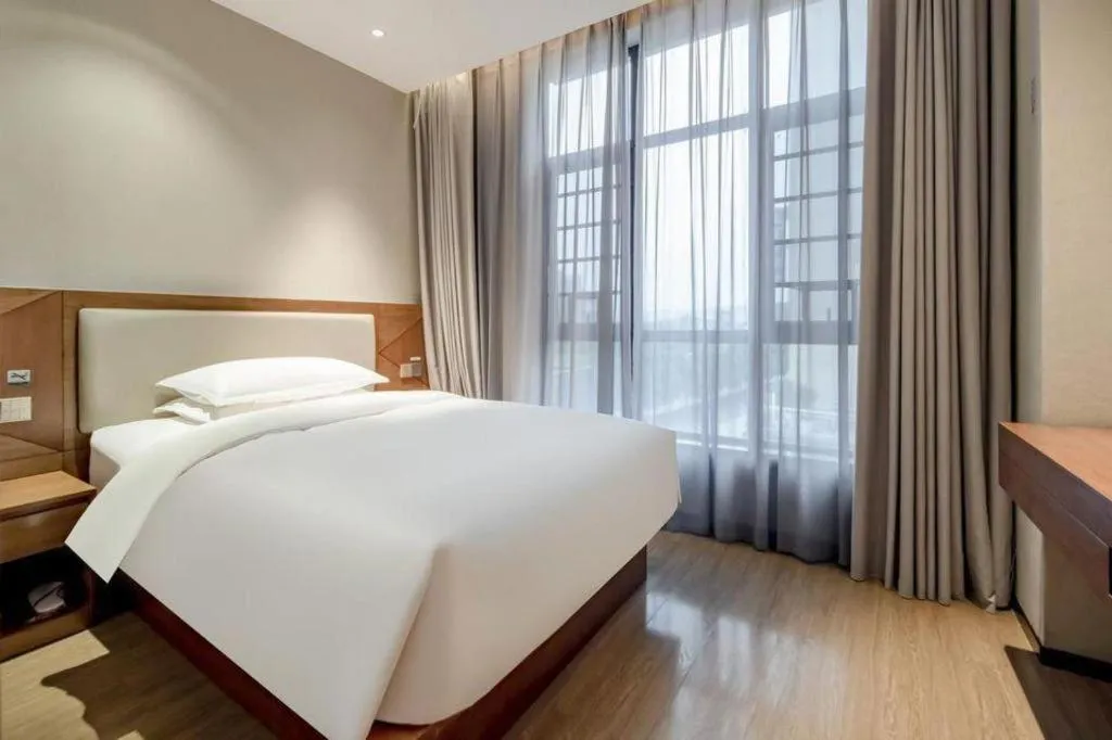 Bed in Borrman Hotel Baise High-speed Railway Station Hengning Plaza