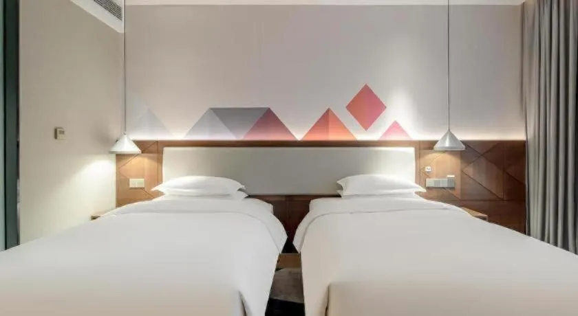 Bed in Borrman Hotel Baise High-speed Railway Station Hengning Plaza