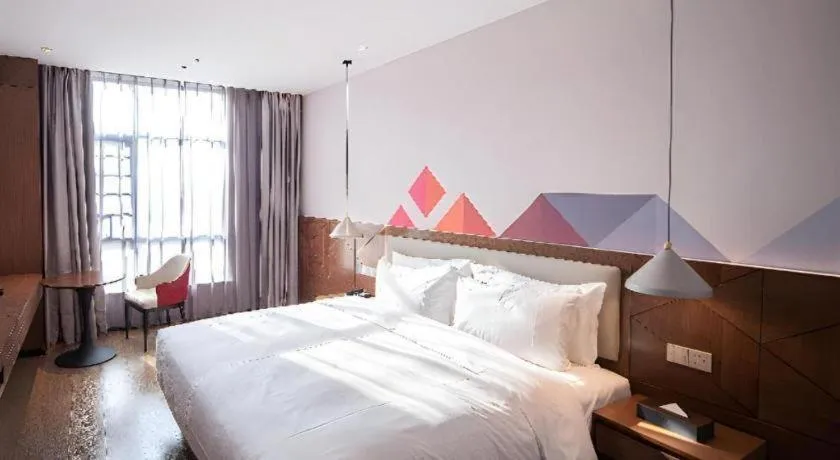 Bed in Borrman Hotel Baise High-speed Railway Station Hengning Plaza