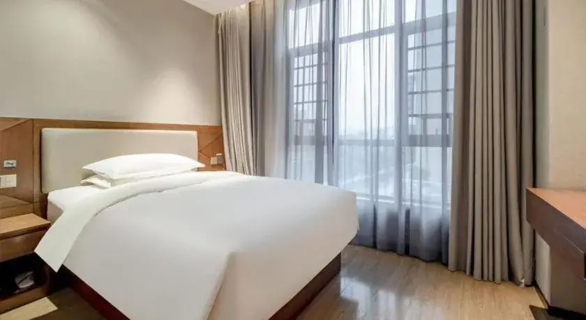 Bed in Borrman Hotel Baise High-speed Railway Station Hengning Plaza Bed in Borrman Hotel Baise High-speed Railway Station Hengning Plaza