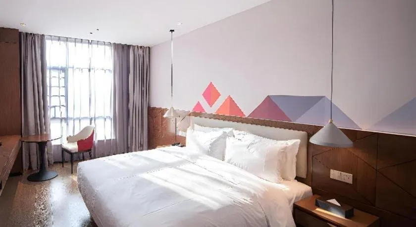 Bed in Borrman Hotel Baise High-speed Railway Station Hengning Plaza